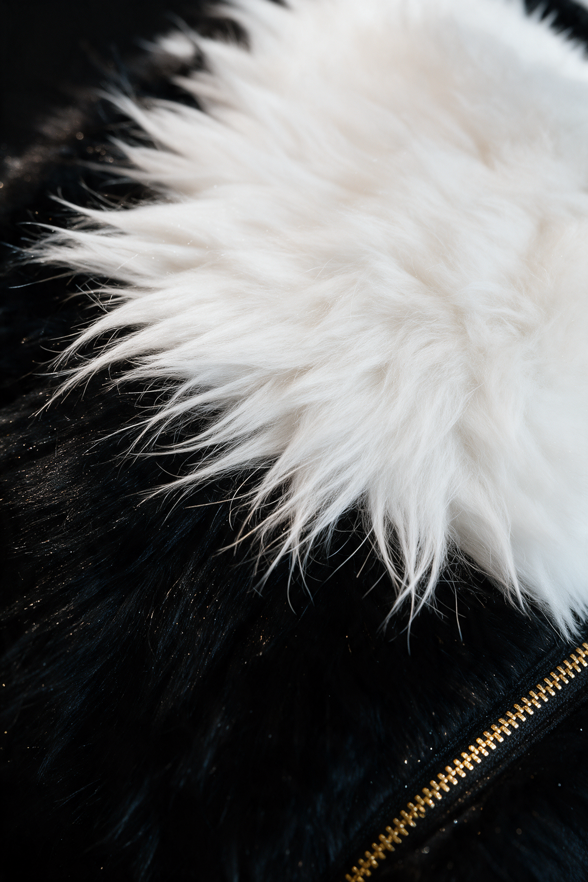 Macro of long-pile plush fur and dark brown tail